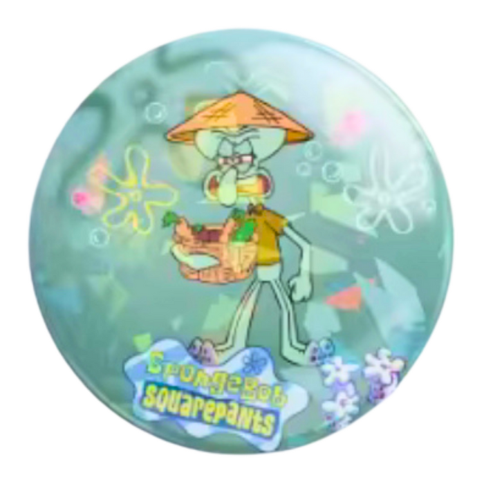 🟣 סיכת סקווידוויד מנצנצת בקוטר 58 מ”מ – Squidward Glitter Badge