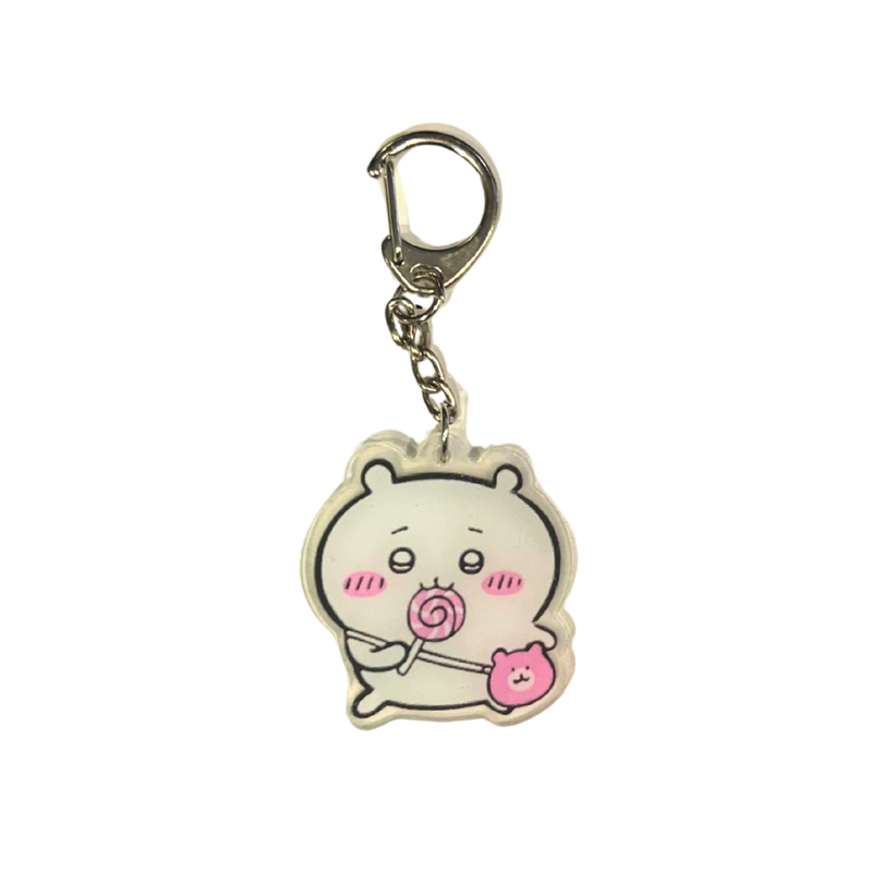🍭 מחזיק מפתחות אקריליק צ’יקאווה (Chiikawa) עם סוכרייה על מקל ודמות ורודה חמודה מבית אנימה מרקט רק ב - https://anime-market.co.il